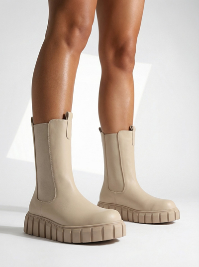 Royalfashion Дамски ботуши с висок плосък ток в екрю Elicane