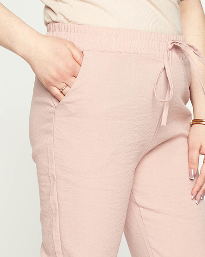 Damskie różowe spodnie materiałowe typu joggery PLUS SIZE- Odzież