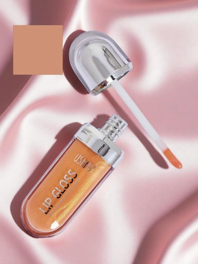 USHAS Блестящ гланц за устни цвят Злато