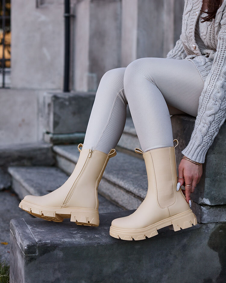 Royalfashion Дамски ботуши с висок плосък ток в екрю Vedita