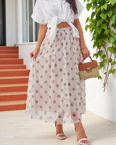 Дамска пола от вискоза с дължина до средата на краката и тули с точки
