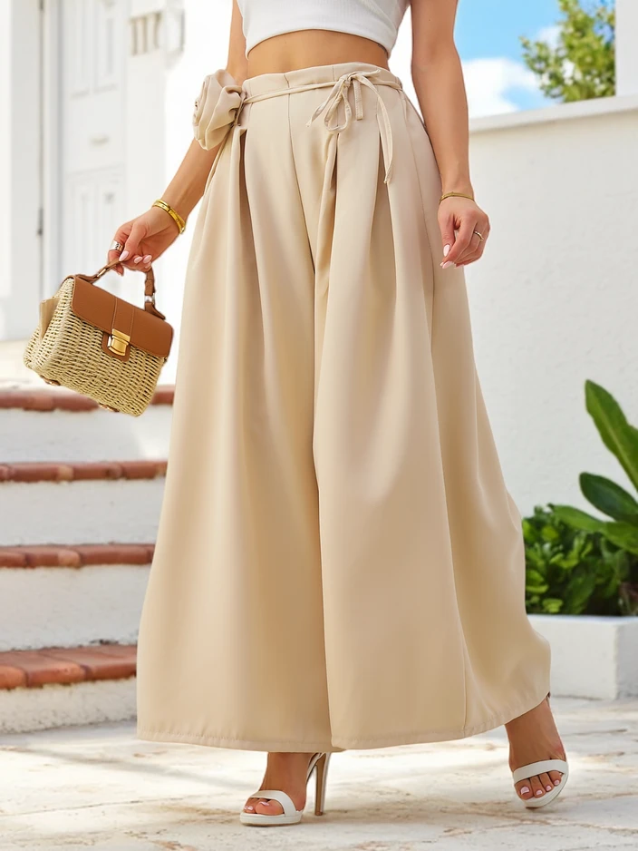 Royalfashion Елегантни широки дамски панталони с декоративно цвете на талията