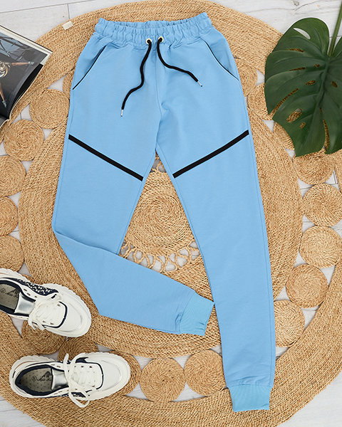 Damskie spodnie dresowe w kolorze niebieskim- Odzież