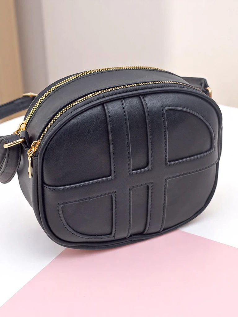 Royalfashion Малка кръгла дамска чанта от еко кожа Riva Circle