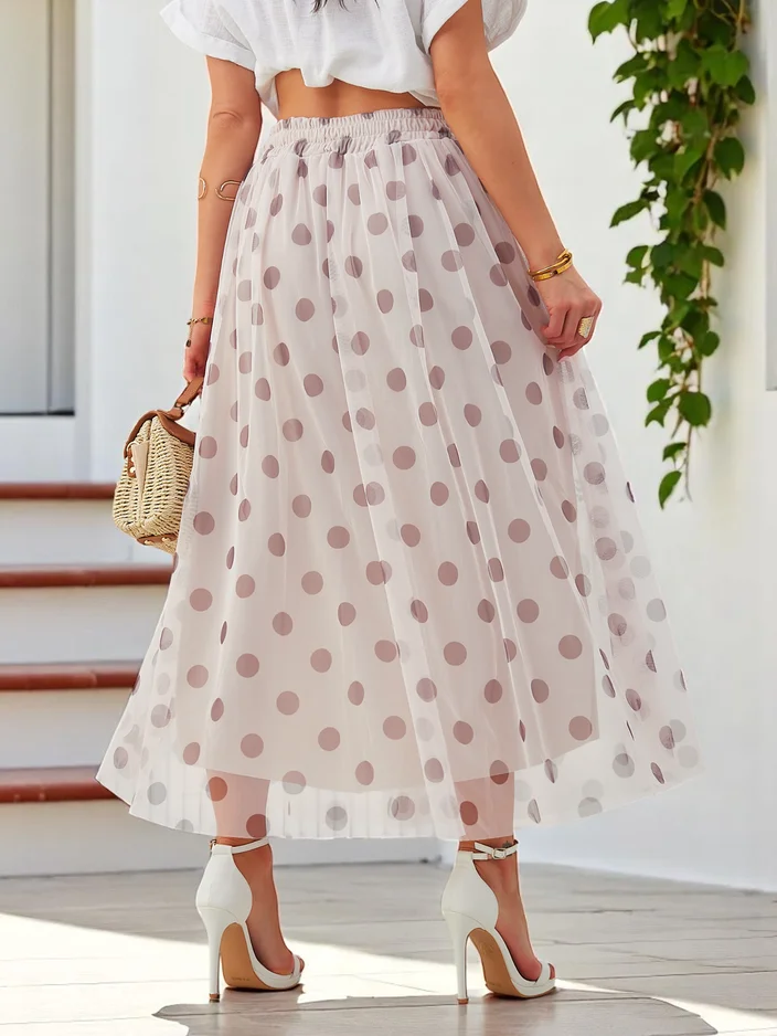 Дамска пола от вискоза с дължина до средата на краката и тули с точки