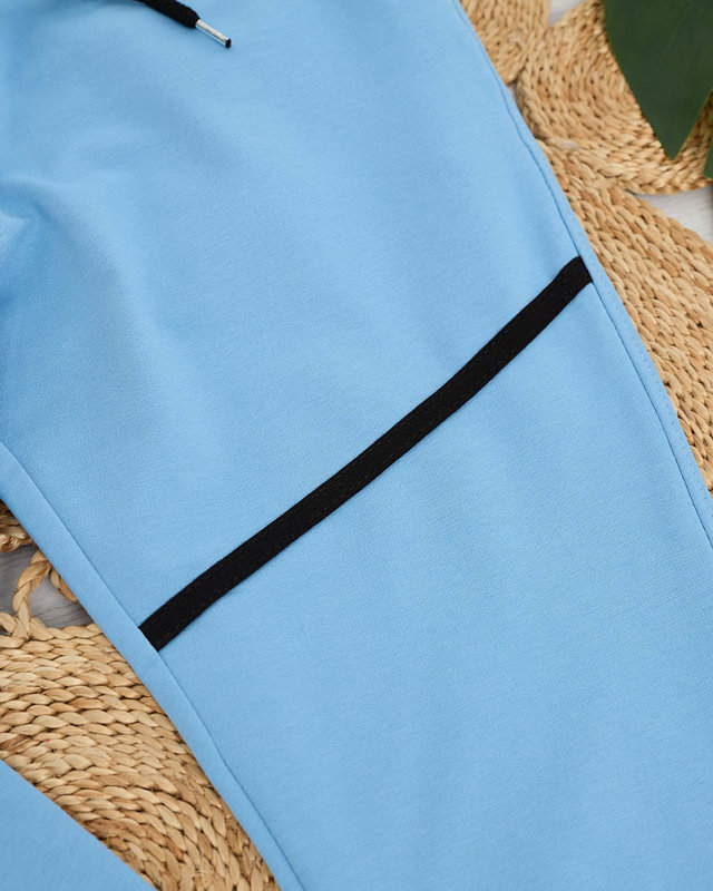 Damskie spodnie dresowe w kolorze niebieskim- Odzież