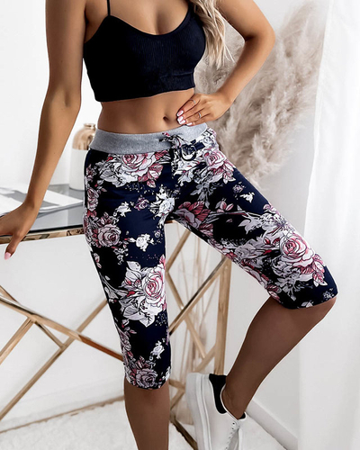 Kwiatowe spodenki damskie 3/4 w kolorze granatowo- koralowym PLUS SIZE - Odzież