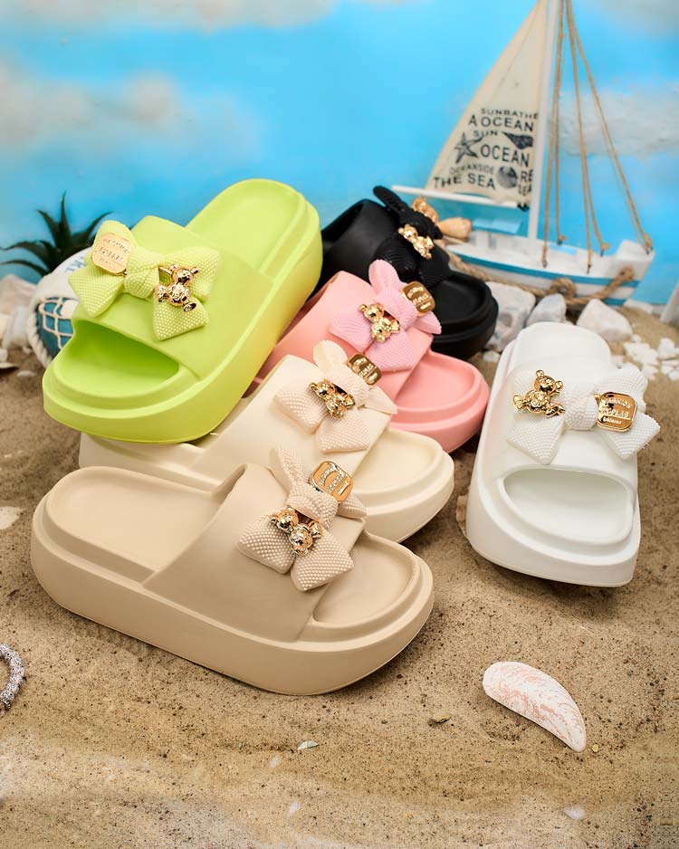 Royalfashion Дамски гумени джапанки с декоративна панделка Nilm