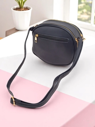 Royalfashion Малка кръгла дамска чанта от еко кожа Riva Circle