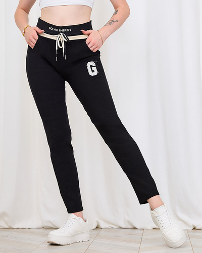 Royalfahion Дамски черен панталон в спортен стил с кръпка PLUS SIZE