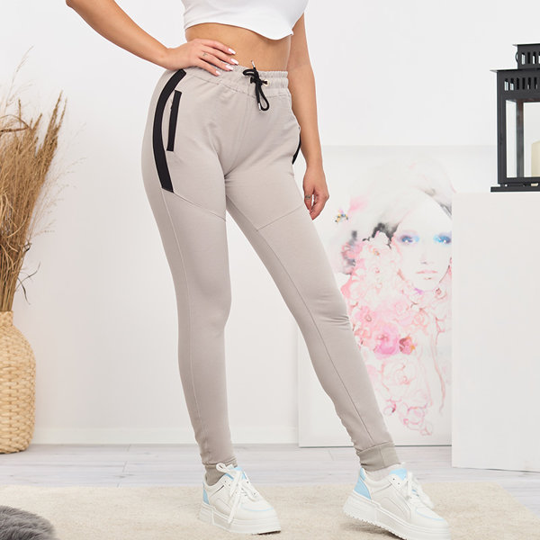 Jasnoszare damskie spodnie dresowe z czarnymi wstawkami- Odzież