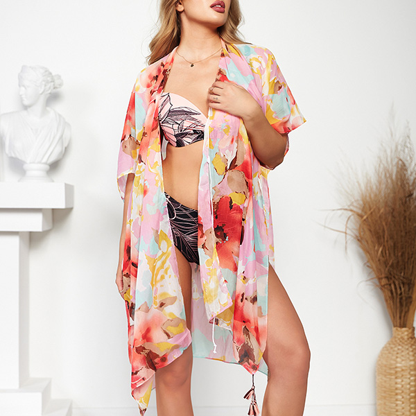 Wzorzyste pareo damskie w kolorze różowym - Odzież