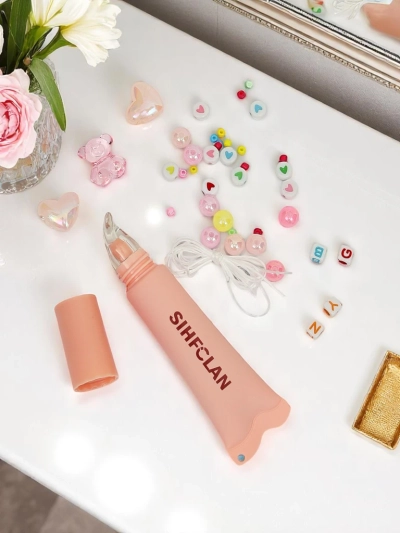 Гланц за устни с гривна Gloss & Charm Cocoa Cookie