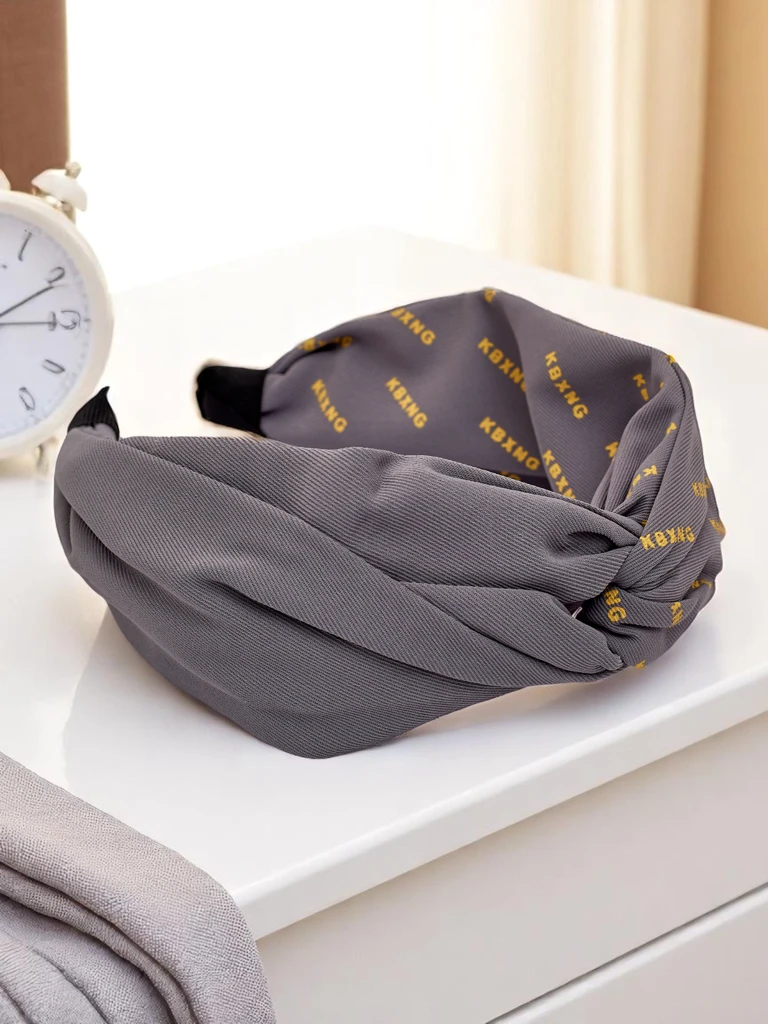 Royalfashion Плетена лента за коса с шарки Laras