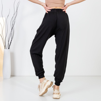 Czarne damskie spodnie haremki - Odzież