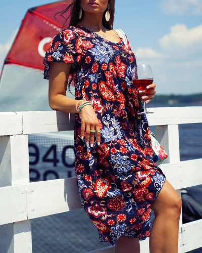 Royalfashion Дамска рокля в морско синьо с цветен десен