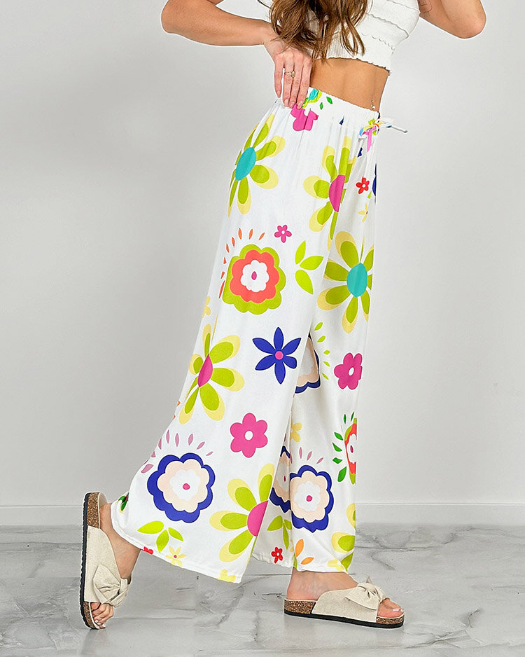 Royalfashion Дамски широки панталони от плат с флорални мотиви