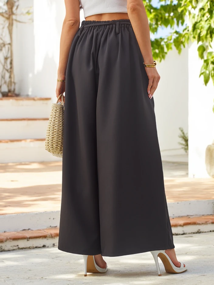 Royalfashion Елегантни широки дамски панталони с декоративно цвете на колана