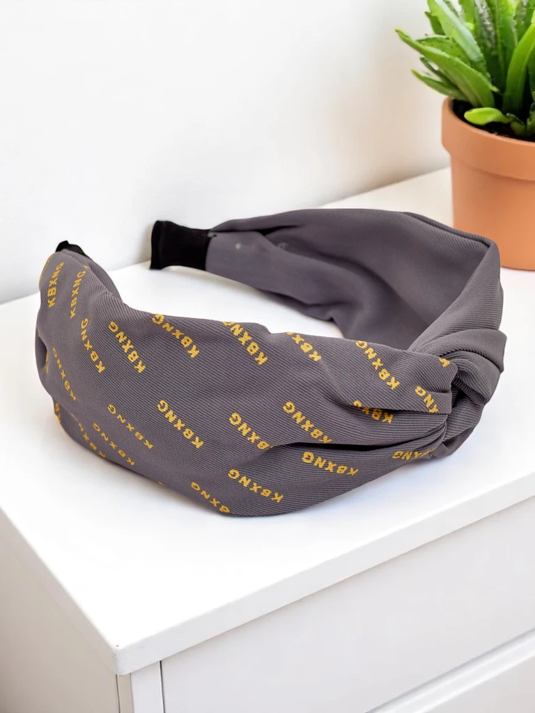 Royalfashion Плетена лента за коса с шарки Laras