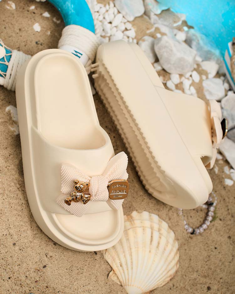 Royalfashion Дамски гумени джапанки с декоративна панделка Nilm