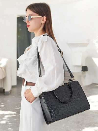 Royalfashion Елегантна дамска чанта от лакова еко-кожа с релеф