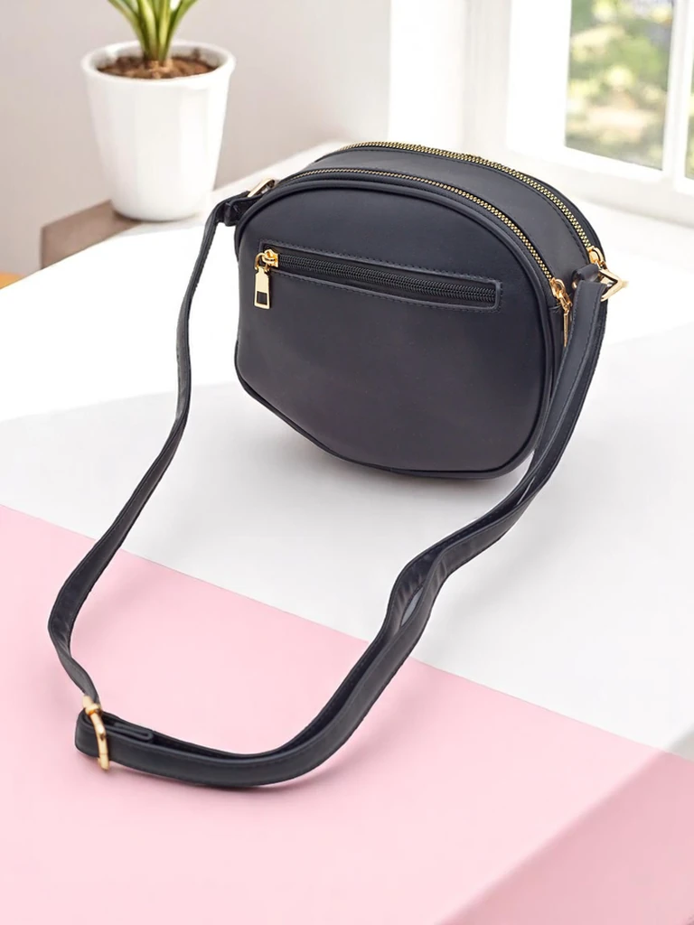 Royalfashion Малка кръгла дамска чанта от еко кожа Riva Circle