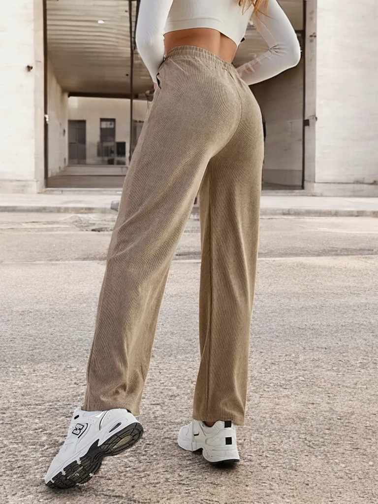 Royalfashion Дамски широки панталони с ребра PLUS SIZE