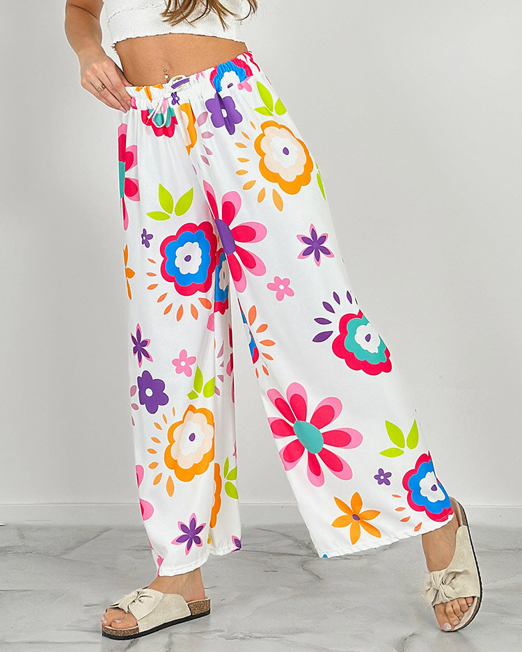 Royalfashion Дамски широки панталони от плат с флорални мотиви